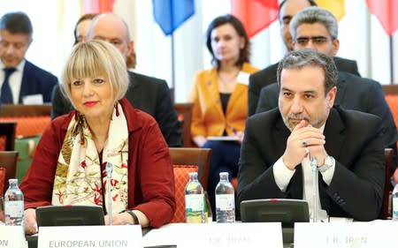 Iran's top nuclear negotiator Araqchi and EEAS Schmit attend a meeting in Vienna