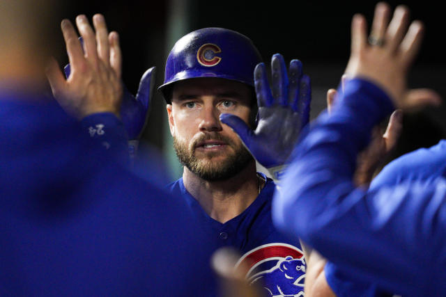 Wisdom's 3 hits, 6-run seventh, power Cubs over Reds 12-5