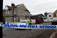 A police officer stands behind cordon tape after a man was arrested in connection with an explosion on the London Underground, in Newport, Wales, Britain, September 20, 2017. REUTERS/Rebecca Naden