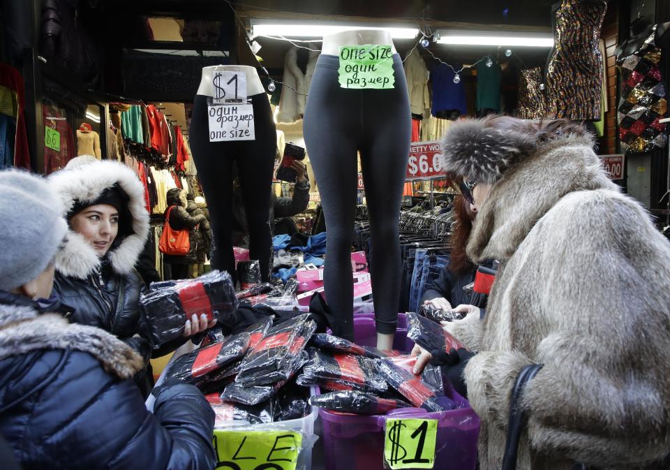 In this Dec. 16, 2016 photo, women choose stockings for sale in a Brighton Beach clothing store in the Brooklyn borough of New York. Most Russian-speaking expatriates interviewed by The Associated Press this past week in New York City’s heavily Russian enclaves shrug off accusations that Kremlin hacking helped sway the presidential election to Donald Trump. While the city overall went nearly 79 percent for Clinton, most precincts in the Brooklyn neighborhoods of Brighton Beach and Sheepshead bay voted "za Trampa,” or for Trump, some as high as 80 percent. (AP Photo/Mark Lennihan)