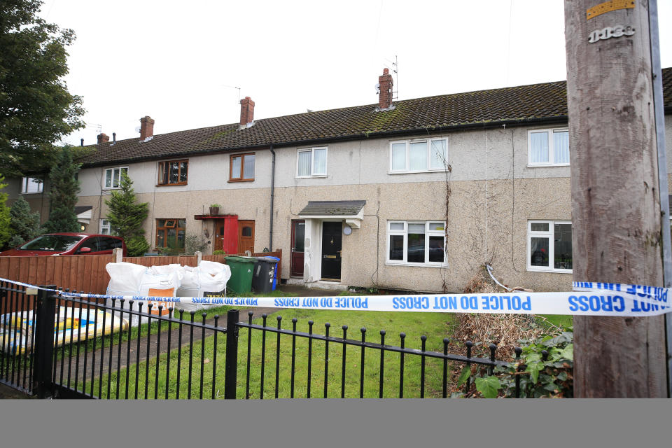 The scene at a property on Graham Road in Widnes in Cheshire, after a 43-year-old woman died after being attacked by two dogs on Tuesday evening.