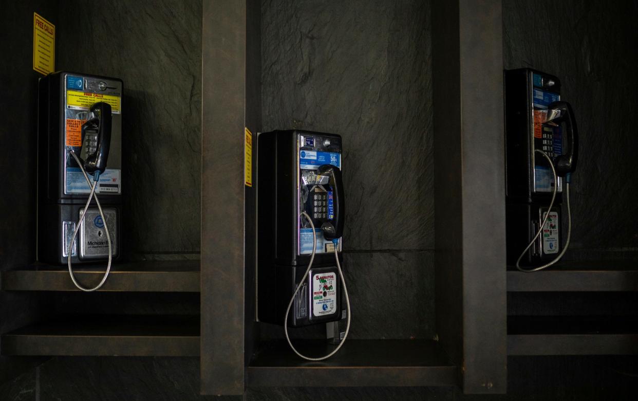 Three pay phones rest inside the Frank Murphy Hall of Justice in Detroit on Saturday, Dec. 9, 2023.