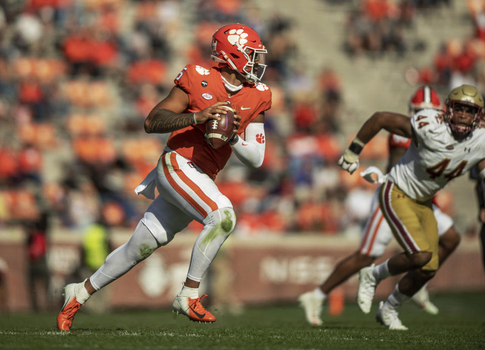 Clemson quarterback D.J. Uiagalelei (5) runs during the first half of an NCAA college football game against Boston College Saturday, Oct. 31, 2020, in Clemson, S.C. (Josh Morgan/Pool Photo via AP)