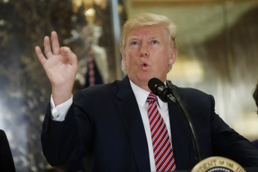 President Donald Trump speaks to the media in the lobby of Trump Tower in New York, Tuesday, Aug. 15, 2017. (AP Photo/Pablo Martinez Monsivais)