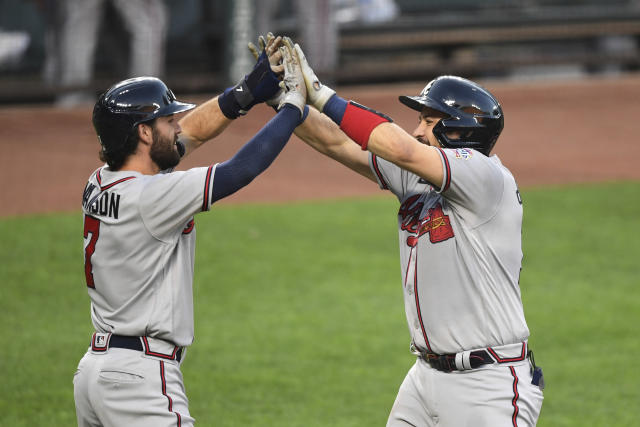 News Photo : Dansby Swanson of the Atlanta Braves watches the