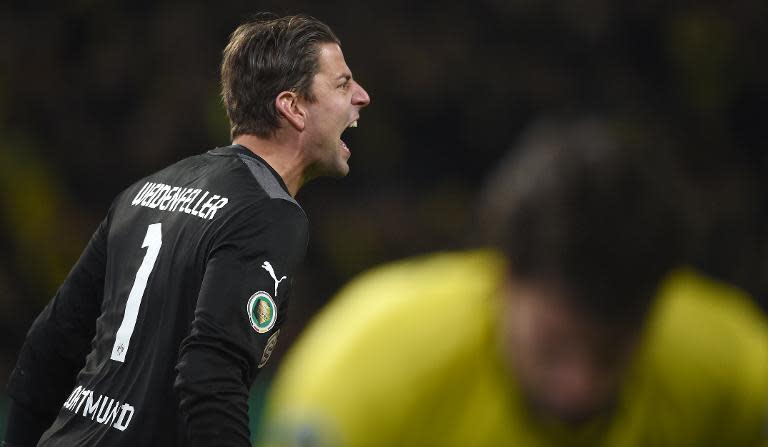 Dortmund's goalkeeper Roman Weidenfeller shouts instructions during the match against Wolfsburg in Dortmund, Germany, on April 15, 2014