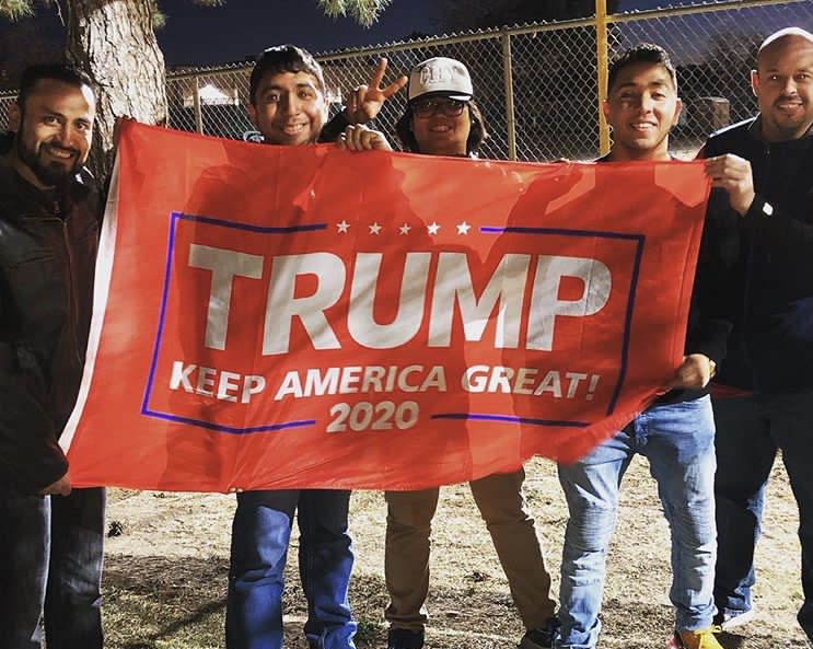 Johnny Alcantar, one of the owners of the Old Plantation — a gay nightclub in El Paso, Texas — is seen with friends holding a flag promoting President Trump’s re-election in 2020. (Photo: Courtesy of Facebook/Puta Kahlo)