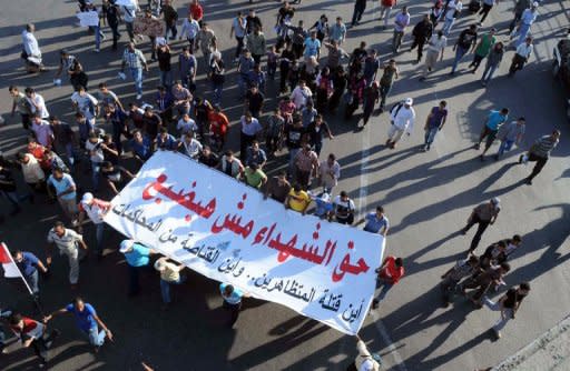 Egyptian protesters holding a banner that reads in Arabic "The rights of the martyrs will not be lost. where are the killers of protesters, where are the snipers" in Cairo on July 23. Six months after they launched a revolution that ousted the regime, Egyptian bloggers have acknowledged that it takes more than a Facebook page on the Internet to overthrow a dictator