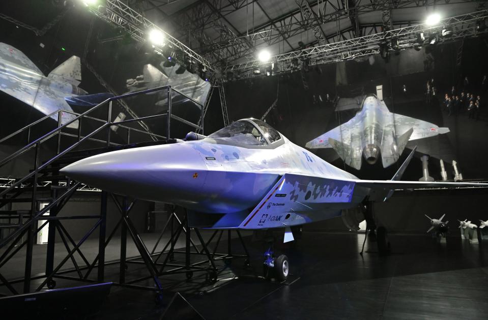 A prototype of a new fighter jet that features stealth capabilities and other advanced characteristics is exhibited at the MAKS-2021 International Aviation and Space Salon in Zhukovsky outside Moscow, Russia, Tuesday, July 20, 2021. Russia on Tuesday unveiled a prototype of its prospective new fighter jet at the Moscow air show. (Alexei Nikolsky, Sputnik, Kremlin Pool Photo via AP)