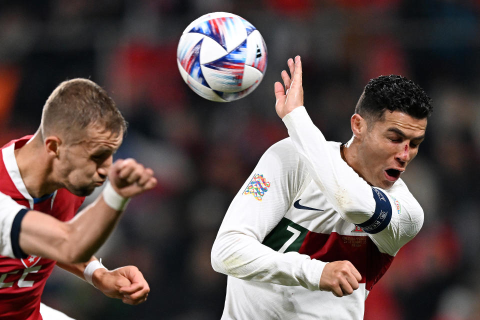 PRAGUE, CZECH REPUBLIC - SEPTEMBER 24: Cristiano Ronaldo of Portugal contends for the aerial ball, which later results in a penalty decision for handball, during the UEFA Nations League League A Group 2 match between Czech Republic and Portugal at Fortuna Arena on September 24, 2022 in Prague, Czech Republic. (Photo by Thomas Eisenhuth/Getty Images)