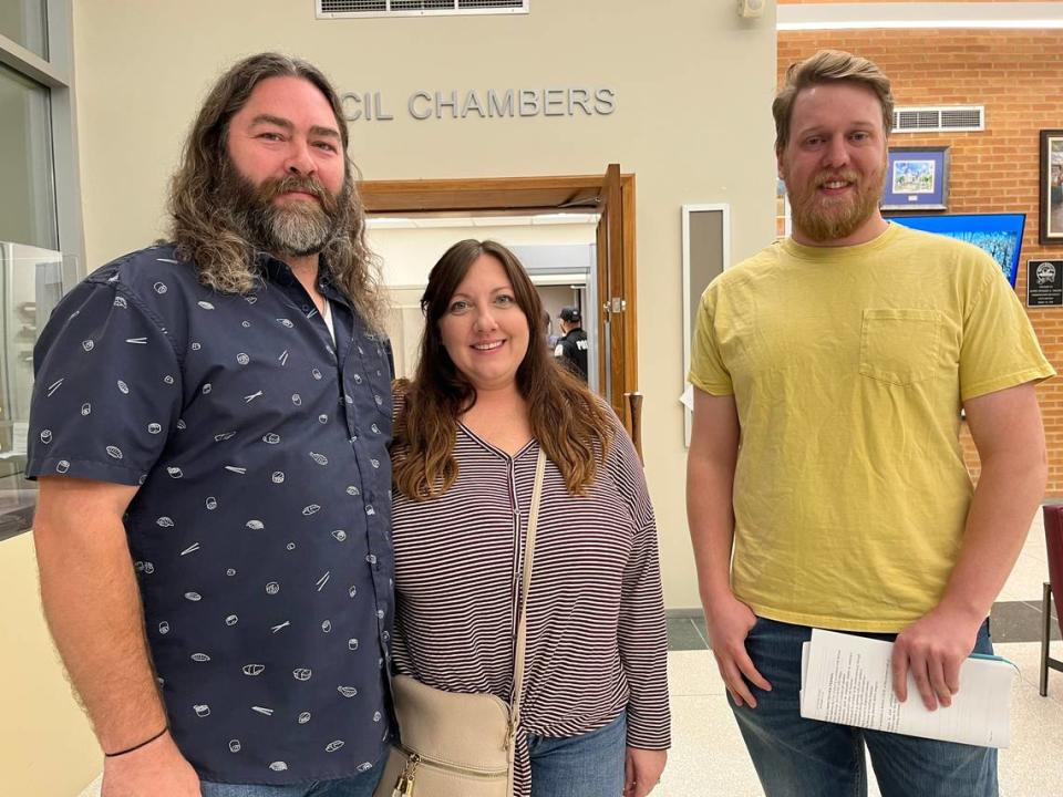 Andrew Tufto, left to right, Amber Tufto and Louis Holm are co-founders of a grassroots organization that spent the past seven months working to persuade Belleville City Council to approve an ordinance allowing residents to keep chickens in their backyards. Teri Maddox/tmaddox@bnd.com