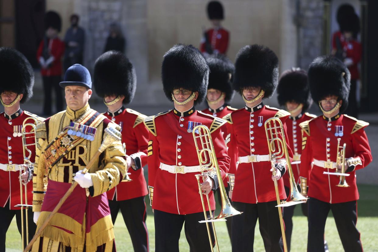 The Foot Guards Band march onEngine Court  ahead of the funeral of Britain Prince Philip's funeral at Windsor Castle, in Windsor, England, Saturday April 17, 2021.