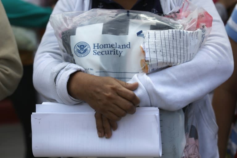 An undocumented immigrant leaves a Texas detention center for a hearing before an immigration court in the city of McAllen