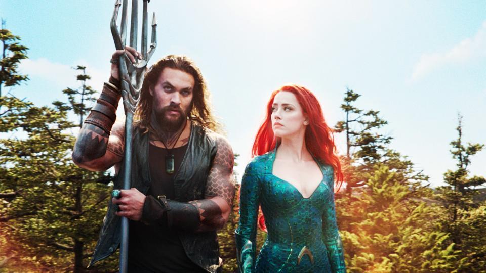 AQUAMAN, from left: Jason Momoa as Aquaman, Amber Heard as Mera, 2018. © Warner Bros./courtesy Everett Collection