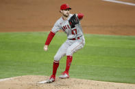 Los Angeles Angels starting pitcher Griffin Canning throws to the Texas Rangers in the second inning of a baseball game in Arlington, Texas, Friday, Aug. 7, 2020. (AP Photo/Tony Gutierrez)