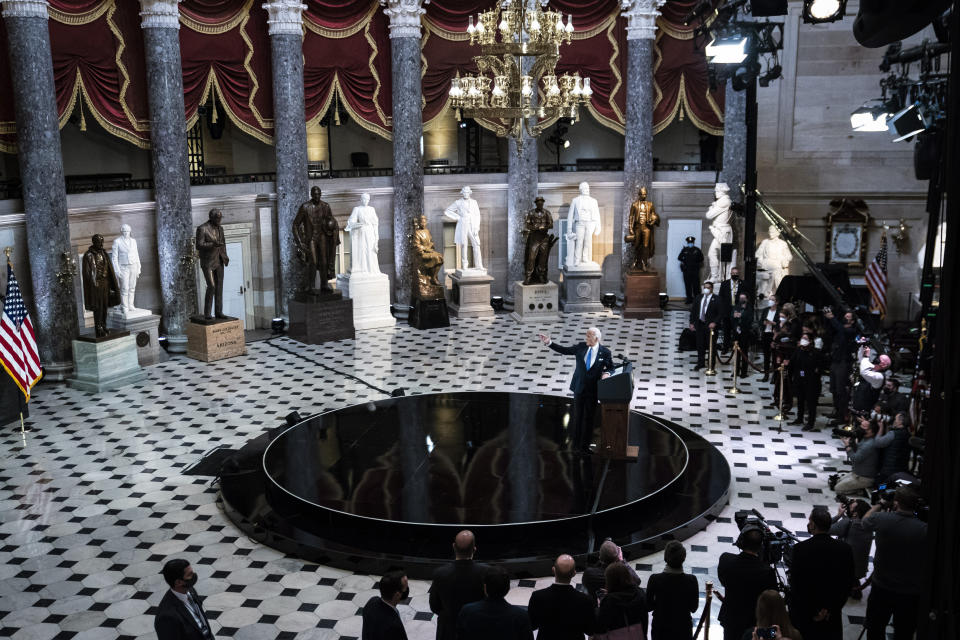 President Joe Biden speaks from Statuary Hall at the U.S. Capitol to mark the one year anniversary of the Jan. 6 riot at the Capitol by supporters loyal to then-President Donald Trump, Thursday, Jan. 6, 2022, in Washington. (Jabin Botsford//The Washington Post via AP, Pool)