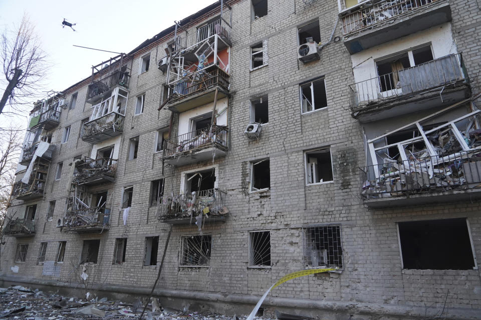 A damaged residential building following a Russian strike in Kharkiv, Ukraine, Wednesday, March 27, 2024. (AP Photo/Andrii Marienko)