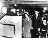<p>The first wedding at the assembly center. Pete Miyashito is being married to Toya Matashito, with the Reverend Donald T. Toriumi of the Presbyterian Church officiating in Santa Anita, California July 2, 1942. There are 20 Protestant Ministers and five Buddhist Priests interned at the center. (AP Photo) </p>