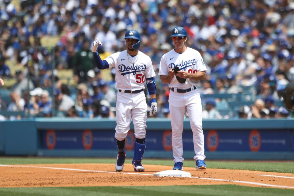 Mookie Betts (50) of the Los Angeles Dodgers reacts to his single in the first inning against the Detroit Tigers at Dodger Stadium in Los Angeles on Sunday, May 1, 2022.
