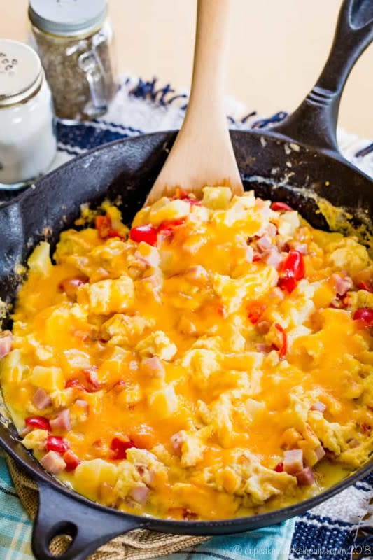 <p>Cupcakes & Kale Chips</p><p>Super fluffy scrambled eggs with cheese, ham, pineapple, and tomatoes might just be the best breakfast scramble you've ever tried.</p><p><strong>Get the recipe: <a href="https://cupcakesandkalechips.com/hawaiian-scrambled-eggs-recipe/" rel="nofollow noopener" target="_blank" data-ylk="slk:Hawaiian Scrambled Eggs;elm:context_link;itc:0;sec:content-canvas" class="link ">Hawaiian Scrambled Eggs</a></strong></p>