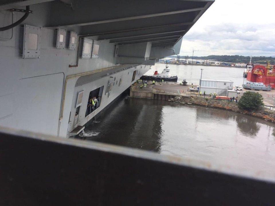 HMS Elizabeth is pulled out of the dock with just metres to spare (Royal Navy)