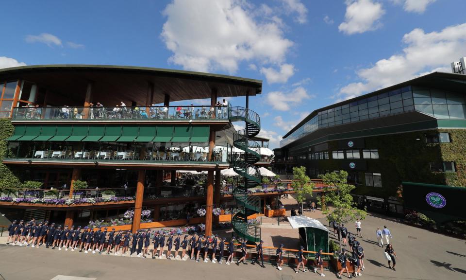 <span>Ball boys and girls line up at Wimbledon in 2019.</span><span>Photograph: Michael Mayhew/Sportsphoto/Allstar</span>