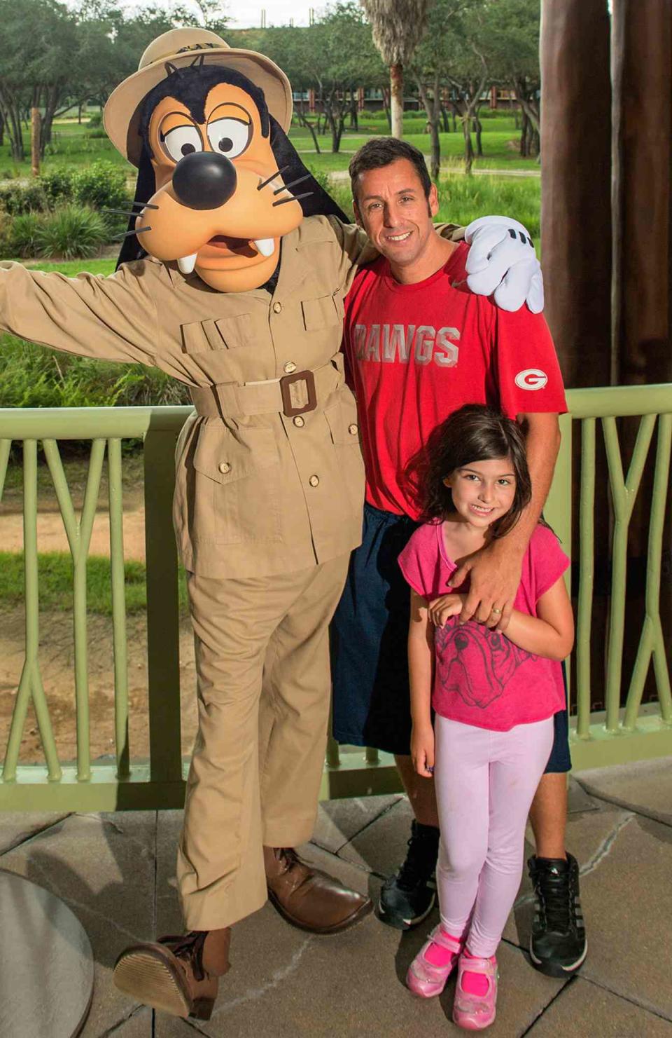 Adam Sandler and daughter Sunny Madeline share a Goofy moment on August 1, 2015 at Disney's Animal Kingdom Lodge while vacationing at the Walt Disney World Resort in Lake Buena Vista, Florida