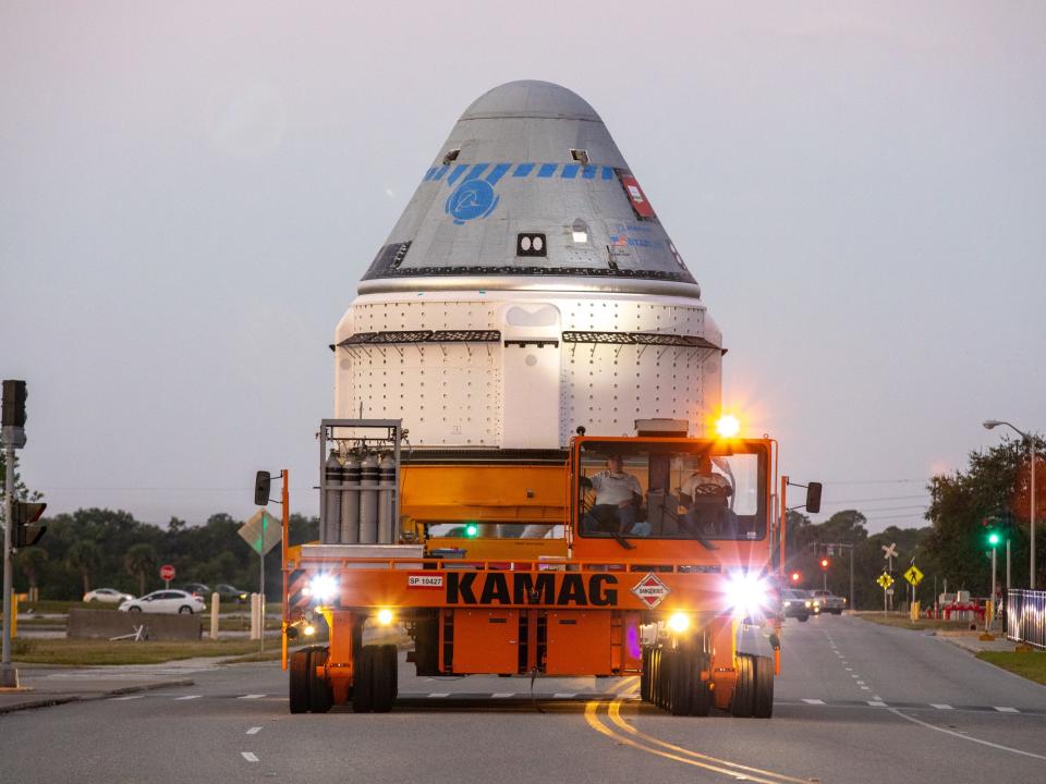 boeing cst 100 starliner spaceship nasa commercial crew program ccp orbital flight test oft crawler truck rollout KSC 20191121 PH CSH01_0007_orig