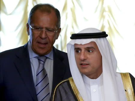 Russian Foreign Minister Sergei Lavrov (L) and Saudi Foreign Minister Adel al-Jubeir enter a hall during their meeting in Moscow, Russia, August 11, 2015. REUTERS/Maxim Shemetov