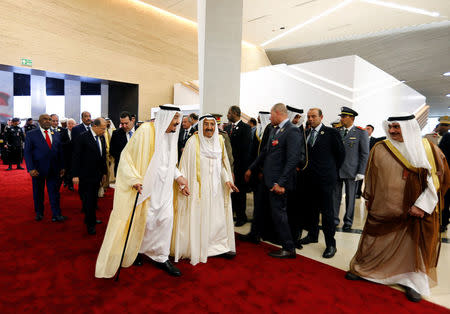 Arab leaders arrive for the group photo before the start of 29th Arab Summit in Dhahran, Saudi Arabia April 15, 2018. REUTERS/Hamad I Mohammed