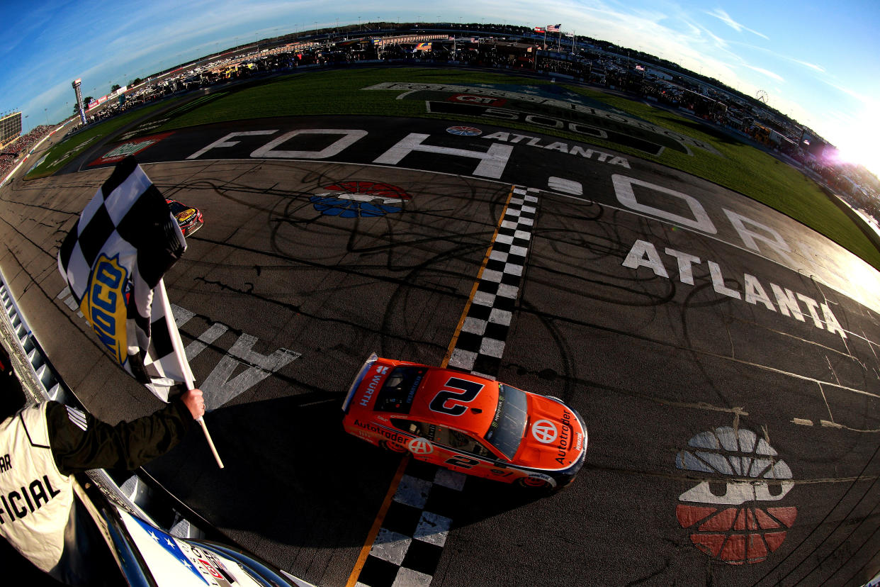 HAMPTON, GA - FEBRUARY 24:  Brad Keselowski, driver of the #2 Autotrader Ford, crosses the finish line to win the Monster Energy NASCAR Cup Series Folds of Honor QuikTrip 500 at Atlanta Motor Speedway on February 24, 2019 in Hampton, Georgia.  (Photo by Sean Gardner/Getty Images)