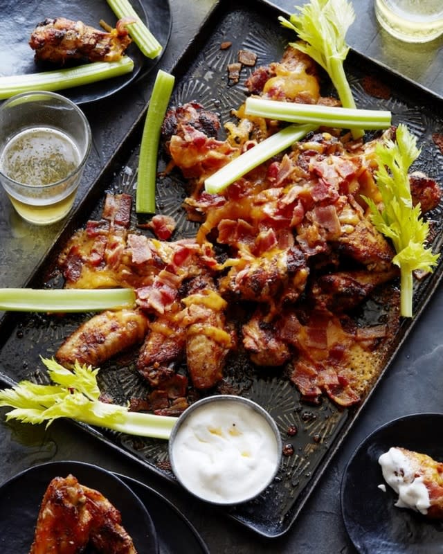 <p>What's Gaby Cooking</p><p>A combo of chicken, cheese and bacon makes for your new favorite game day wing.</p><p><strong>Get the recipe: <a href="https://whatsgabycooking.com/bacon-cheddar-buffalo-wings/" rel="nofollow noopener" target="_blank" data-ylk="slk:Bacon Cheddar Buffalo Wings;elm:context_link;itc:0;sec:content-canvas" class="link ">Bacon Cheddar Buffalo Wings</a></strong></p>