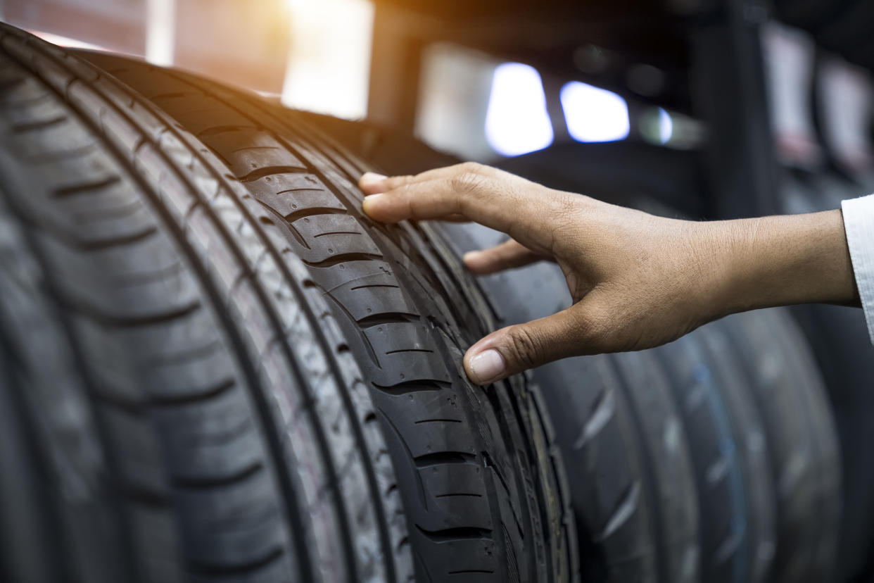 Hand finger checking tires