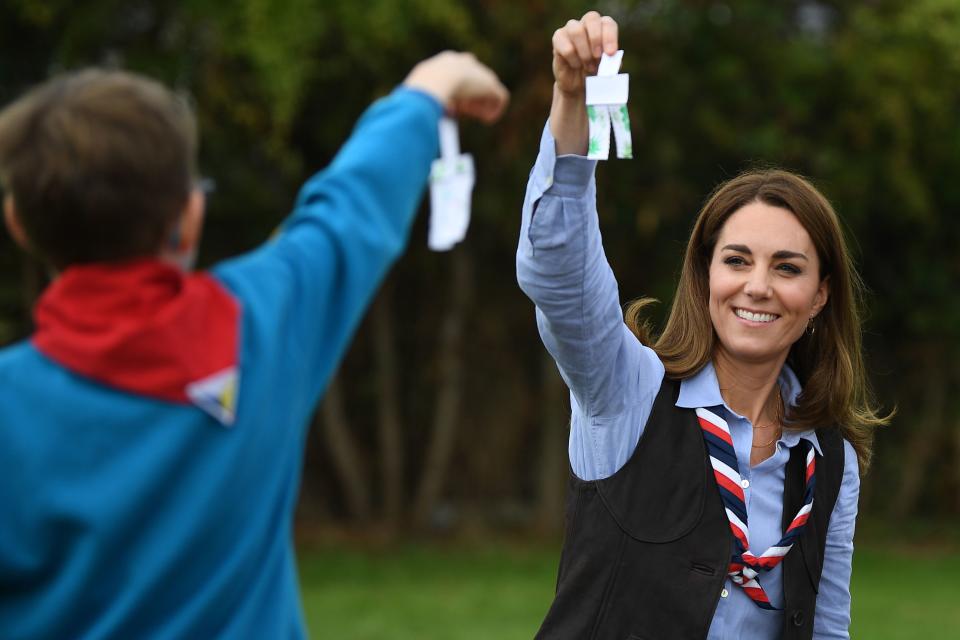 Britain's Catherine, Duchess of Cambridge talks with members of the Beavers as she visits a Scout Group in Northolt, northwest London on September 29, 2020, where she joined Cub and Beaver Scouts in outdoor activities. - The Duchess learned how the Scouts have adapted during the COVID-19 pandemic, and continued Scouting sessions and online activities. (Photo by Daniel LEAL-OLIVAS / various sources / AFP) (Photo by DANIEL LEAL-OLIVAS/AFP via Getty Images)