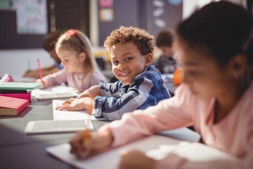 <span class="caption">Learning – and talking – together...</span> <span class="attribution"><a class="link " href="https://www.shutterstock.com/image-photo/portrait-smiling-schoolboy-doing-his-homework-646960948" rel="nofollow noopener" target="_blank" data-ylk="slk:Shutterstock;elm:context_link;itc:0;sec:content-canvas">Shutterstock</a></span>