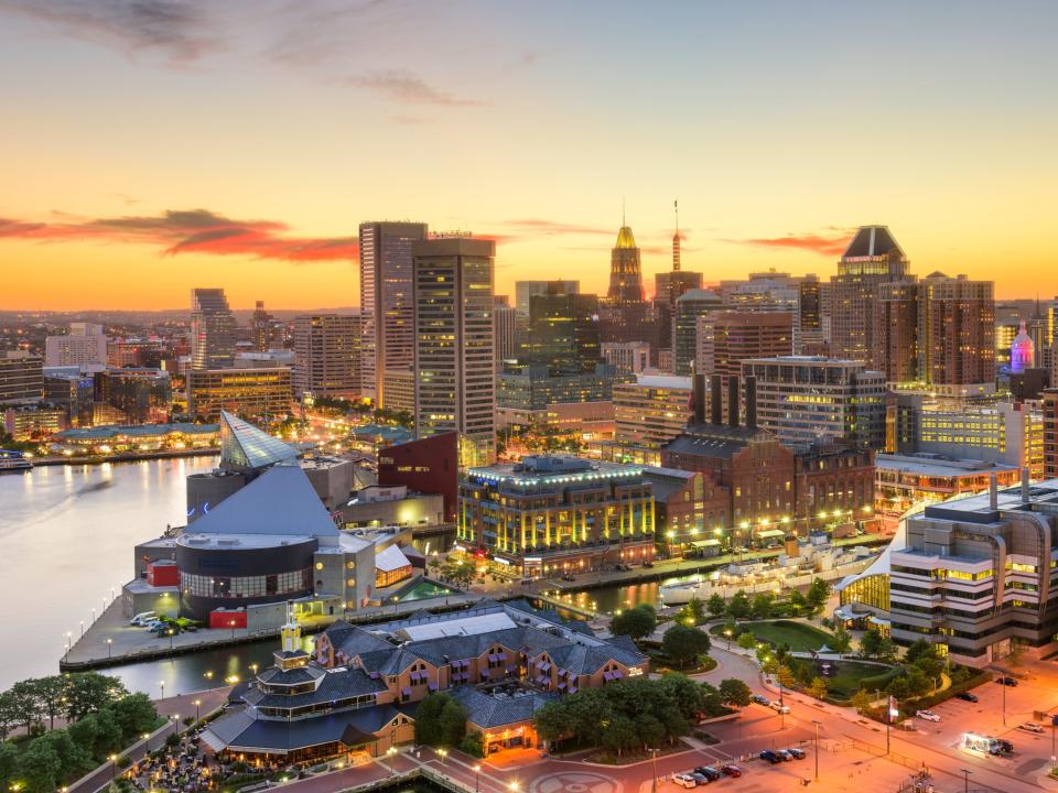 Baltimore, Maryland, downtown cityscape at dusk.