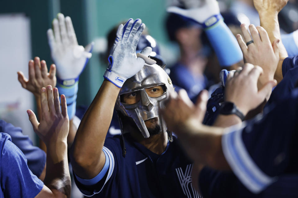 Kansas City Royals' Edward Olivares celebrates in the dugout after hitting a two-run home run against the New York Yankees during the first inning of a baseball game in Kansas City, Mo., Friday, Sept. 29, 2023. (AP Photo/Colin E. Braley)