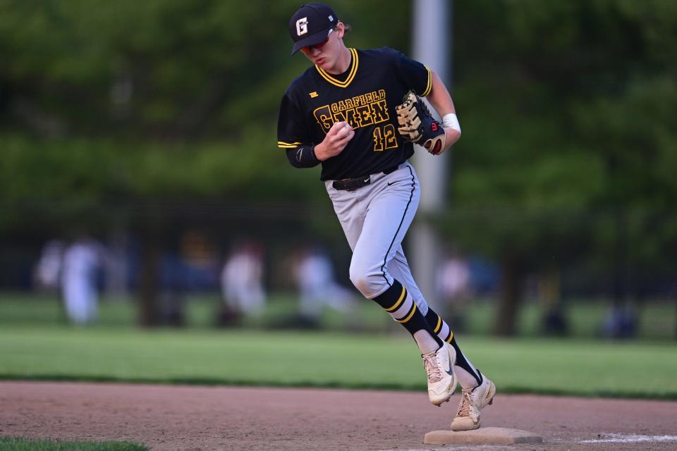 Aidan Hill, shown during last year's district tournament, had a walk-off sacrifice fly to lift Garfield to the district championship game for the second straight year.