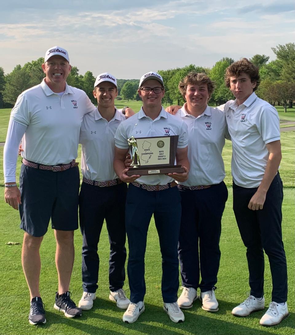 The Wall golf team won its second straight NJSIAA Group 2 championship, and its third in four years. (Left to right) Coach Matt Stefanski; Charlie Cormey; Pat Scenna; Chase Jakabowski; and Boden Pepe.