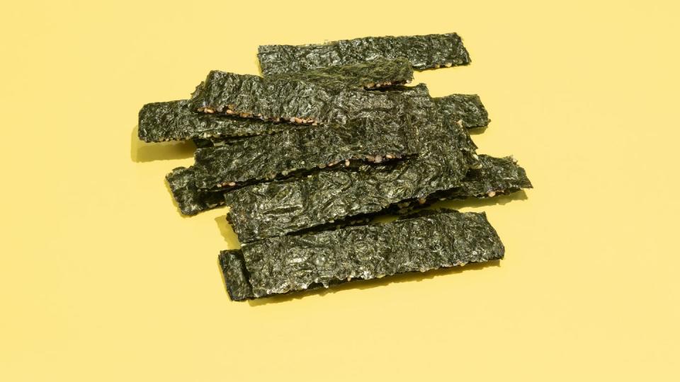 snacks for diabetics seaweed snack on yellow background