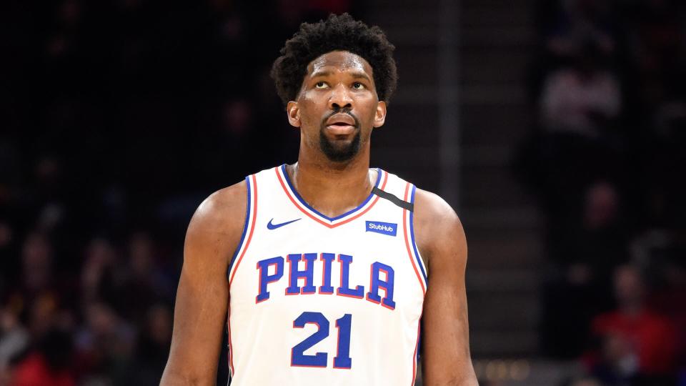 CLEVELAND, OHIO - FEBRUARY 26: Joel Embiid #21 of the Philadelphia 76ers watches the scoreboard during the first half against the Cleveland Cavaliers at Rocket Mortgage Fieldhouse on February 26, 2020 in Cleveland, Ohio.
