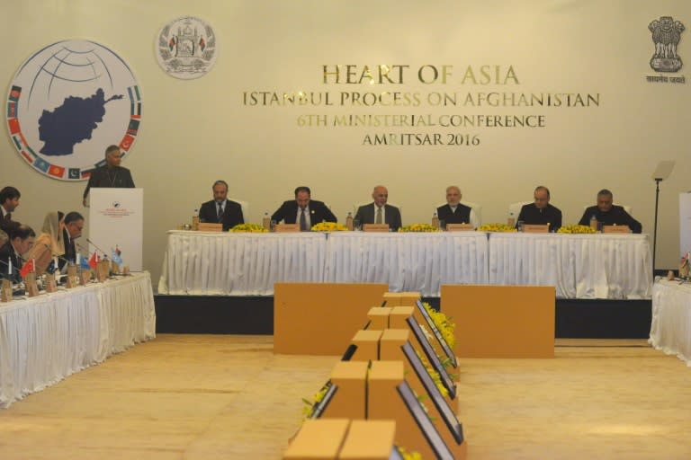 Indian Prime Minister Narendra Modi (C), Afghan President Ashraf Ghani (8L), Indian Finance Minister Arun Jaitley (2R) and Indian Union Minister VK Singh (R) listen to a speaker at the 6th Heart of Asia Ministerial Conference on December 4, 2016