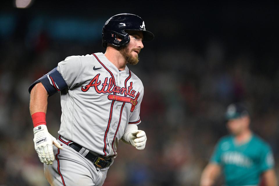 Atlanta Braves' Robbie Grossman runs the bases after hitting a solo home run against the Seattle Mariners during the sixth inning of a baseball game Friday, Sept. 9, 2022, in Seattle. (AP Photo/Caean Couto)
