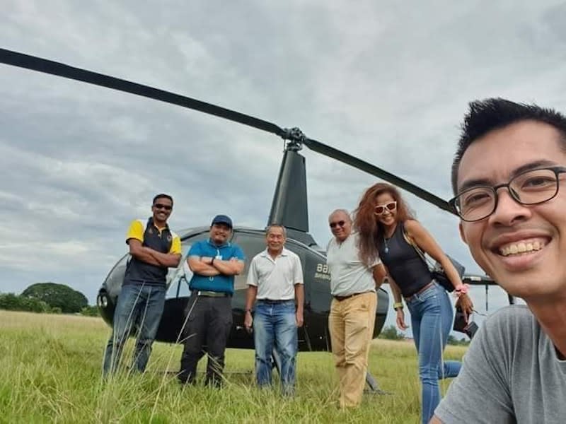 Former MAS CEO Ahmad Jauhari (3rd left) is seen with a few others before the ill-fated helicopter took off. — Picture courtesy of Twitter/Facebook