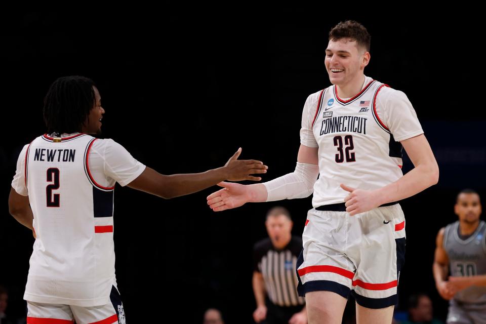 NEW YORK, NEW YORK - MARCH 22: Donovan Clingan #32 of the Connecticut Huskies reacts in the second half against the Stetson Hatters in the first round of the NCAA Men's Basketball Tournament at Barclays Center on March 22, 2024 in New York City. (Photo by Sarah Stier/Getty Images)