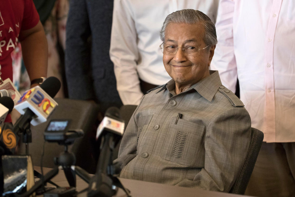 Mahathir Mohamad smiles during a press conference in Kuala Lumpur on 10 May. (PHOTO: Associated Press)