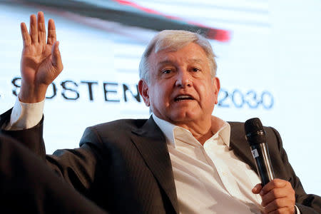 FILE PHOTO: Leftist front-runner Andres Manuel Lopez Obrador of the National Regeneration Movement (MORENA) addresses the audience during a conference organised by the Mexican Construction Industry Association in Guadalajara, Mexico March 23, 2018. REUTERS/Henry Romero