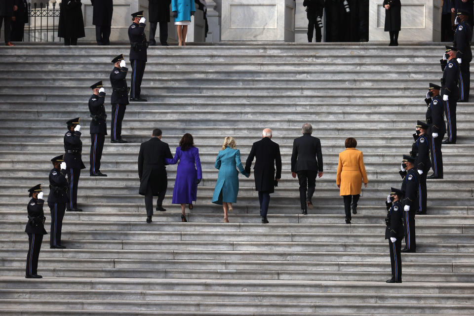 (L-R) Doug Emhoff, U.S. Vice President-elect Kamala Harris, Jill Biden, President-elect Joe Biden, U.S. Sen. Roy Blunt (R-MO) and U.S. Sen. Amy Klobuchar (D-MN)  walk into the U.S. Capitol. (Joe Raedle/Getty Images)