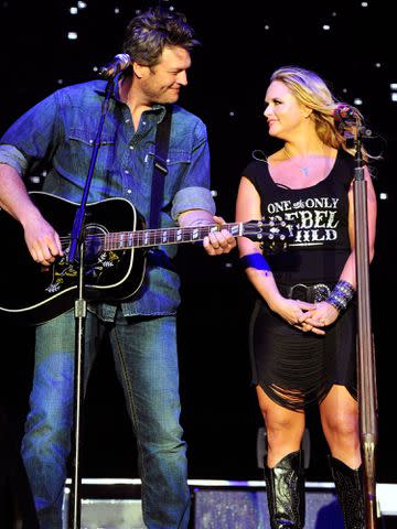 <p>Frazer Harrison/Getty</p> Blake Shelton and Miranda Lambert perform onstage during the Stagecoach Country Music Festival on April 28, 2012 in Indio, California.