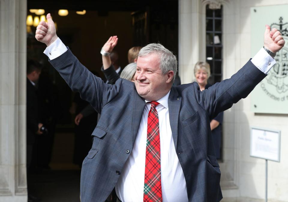 SNP Westminster leader Ian Blackford MP celebrated outside the court (PA)